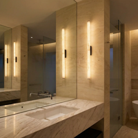 Applique murale LED de luxe style Onyx avec cadre métallique, lumière blanc chaud 3500K, design contemporain pour hôtels, villas et intérieurs résidentiels
