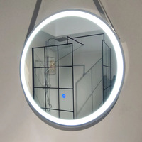 Miroir LED de salle de bain intelligent au design élégant de 600 mm, design minimaliste rond avec détection tactile