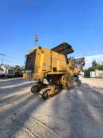 Fraiseuse routière Caterpillar PM200 importée de 2015, robuste, avec moteur de 429 kW et coupeuse de 2 mètres pour la construction routière