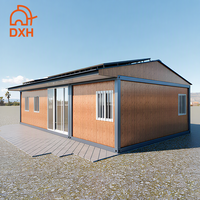 conteneur à cadre plat en acier avec panneaux solaires petite maison préfabriquée détachable facile à assembler pour appartement