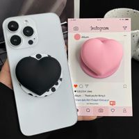 Support de téléphone magnétique rose 3D design, best-seller, super populaire, polyvalent pour le bureau et les séries TV
