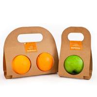 Herbruikbare kraftpapieren fruitverpakking met handvat voor één sinaasappel en voor kerstcadeausets - feestelijke verpakking