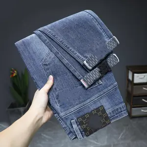 Autumn and winter new elastic business slim casual trend blue men and women jeans stock