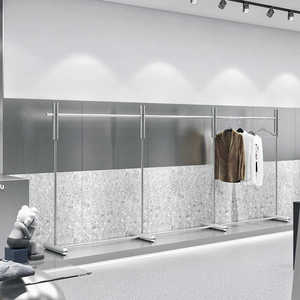 Étagères de présentation pour magasins de vêtements : rails à vêtements en acier inoxydable noir, étagères d'îlot de présentation sur pied blanches - Product Image 5