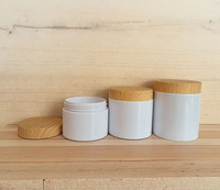 Pot à beurre corporel Crème de luxe en plastique pour animaux de compagnie 30g 50ml 100ml 200ml 250ml Pots cosmétiques en plastique blanc avec couvercle en bambou pour cosmétiques