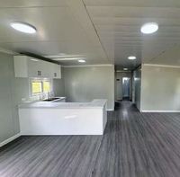 Maison conteneur extensible de 20 pieds - Maison modulaire préfabriquée avec cuisine et salle de bain complètes, prête à l'emploi pour dortoirs, complexes hôteliers et gîtes.