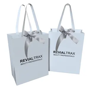 Vente en gros de sacs à provisions en papier de haute qualité au détail sac en papier vert avec logo sac en papier cadeau de style simple avec nœud