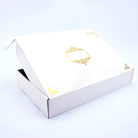Boîte d'expédition en carton ondulé avec logo personnalisé en estampe à chaud pour vêtements, t-shirts et emballages d'expédition