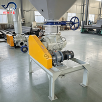 Convoyeur pneumatique à phase dense pour poudre abrasive