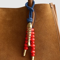 Breloque de sac tissée à la main avec pompon, pendentif vintage en perles étoile et cœur, accessoires de mode quotidiens pour sac à main et porte-clés pour femme
