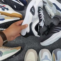Vente en gros en vrac de baskets pour hommes tendance 2022, chaussures de sport décontractées respirantes de haute qualité pour hommes