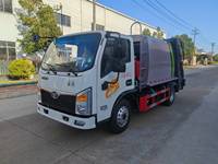 Camion à ordures compacté Sinotruk de 6 mètres cubes pour utilisation en rue