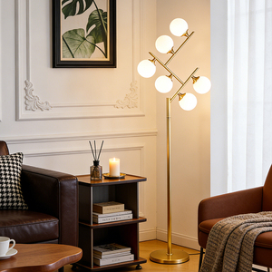 Lampe sur pied en cuivre postmoderne personnalisée en métal avec boule de verre, design élégant pour salon et chambre, idéale pour villa - Product Image 1