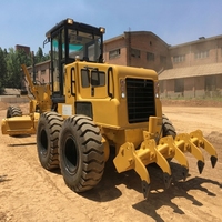 Niveleuse à moteur PY180C de 180 CV à fonctionnement fluide avec lame et ripper robustes pour la construction de routes rurales et la finition des terrains