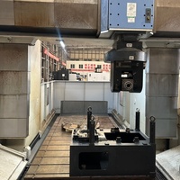 Centre d'usinage à 5 axes de type portique Doosan DCM-2740U coréen disponible à la vente