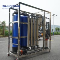 Machine d'osmose inverse industrielle 1000 LPH, système de filtration d'eau RO en acier inoxydable FRP 4040 pour le traitement de l'eau potable pure