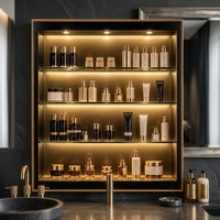 Vitrine de salle de bain murale rétroéclairée avec étagères en verre et finition dorée, pour rangement encastré