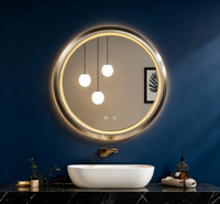 Miroir de salle de bain rond à LED, cadre en alliage d'aluminium, support anti-buée OEM disponible, idéal pour les projets hôteliers et d'appartements.