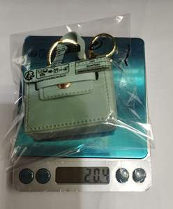 Mini Bolso de Cuero con Borla, Llavero de Lujo, Colgante para Llaves, Bolsa de Almacenamiento Portátil, Amuleto de Moda, Regalo para Mujer - Product Image 6