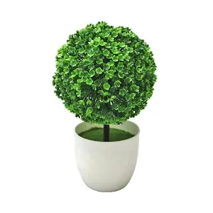 Artificial decorations of simulated plants Small plastic realistic white flower pots in the office are used for outdoor