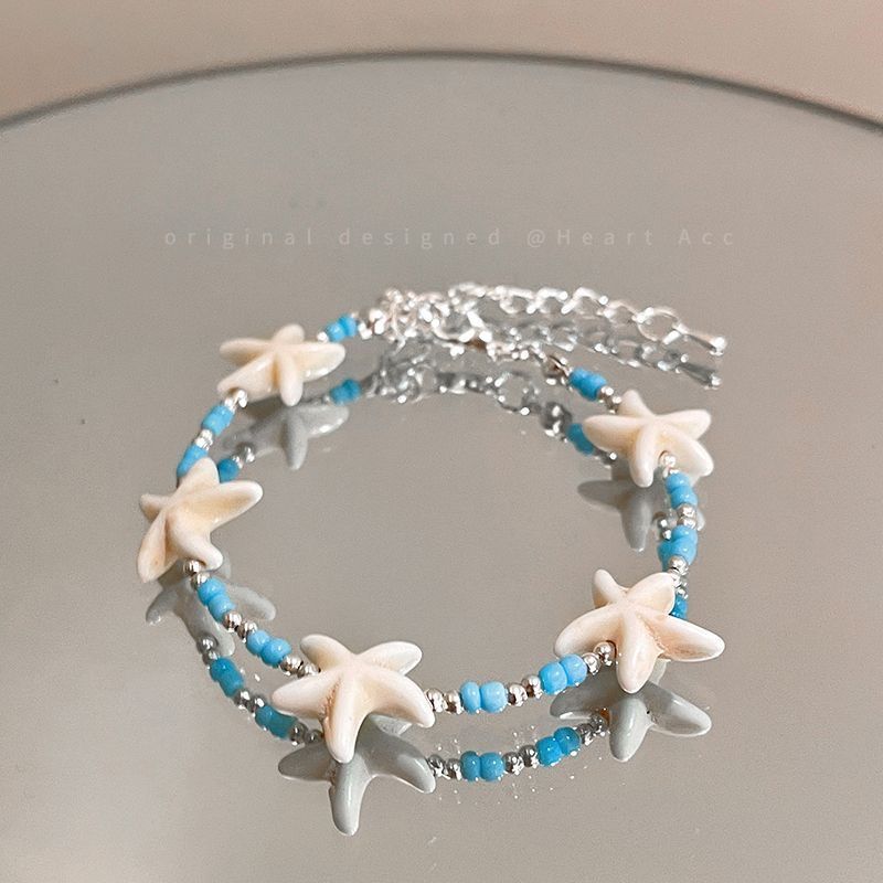 สร้อยข้อมือปลาดาวสีขาว
