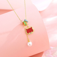 Collier tendance chat mignon pour filles et femmes, avec chaton incrusté d'agate rouge, pendentif en forme de beignet, plaqué or, cadeau