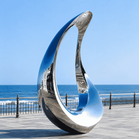 Sculpture abstraite en acier inoxydable poli miroir pour jardin, cour, villa et installation artistique extérieure
