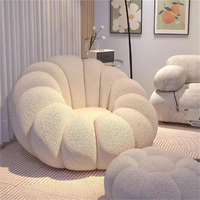 Canapé fauteuil de salon en velours coloré de style nordique moderne avec un design en forme de citrouille crème