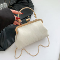 Sac à main élégant pour femme, nouvelle collection, couleur unie, tendance, avec fermoir, design de niche, bandoulière chaîne, forme coquille