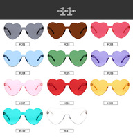 Lunettes de soleil sans cadre personnalisées couleur bonbon PC sans monture, nouvelles lunettes de soleil tendance en forme de cœur pour femmes, meilleures ventes