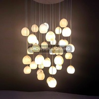 Lustre moderne de luxe créatif en pierre d'albâtre ronde pour salon, restaurant, escalier, décoration de la maison, luminaire suspendu