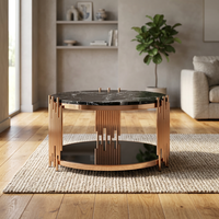Table basse ronde de style indien et italien avec plateau en marbre et structure en métal finition cuivre, mobilier contemporain pour salon