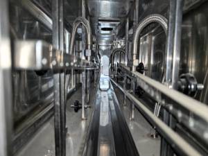 Stoomkrimptunnel met stoomgenerator voor het etiketteren van ronde flessen en bekers in de melkverwerking - Product Image 6