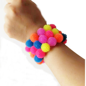 สร้อยข้อมือ TPR ยี่ห้อ Jincan Creative 12 สี ลูกบอลปุยหิมะหลากสี ของเล่นบีบคลายเครียดสำหรับเด็กชายและเด็กหญิง ของเล่นบีบกาวนุ่ม บรรเทาความเครียดสำหรับเด็ก - Product Image 1