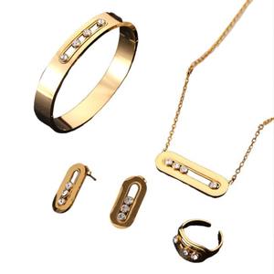 Nuovissimi Set di Gioielli INS in Acciaio Inossidabile Placcato <span class=keywords><strong>Oro</strong></span> 18K Collana Orecchini Anello Collana Scorrevole Catena per Clavicola Mobile da <span class=keywords><strong>Donna</strong></span> - Product Image 6