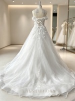 Robe de mariée romantique épaules dénudées coupe trapèze, en dentelle à motif feuille, tulle scintillant, décolleté en V profond, à lacets, personnalisable