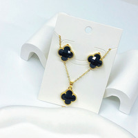 Nouvelle collection de bijoux Clover en cuivre plaqué or 14 carats, ensemble collier et boucles d'oreilles classiques à motif de fleur porte-bonheur pour mariage et soirée