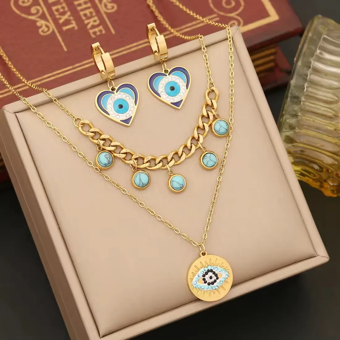 Set Perhiasan Wanita Mode anting kalung mata setan biru bentuk hati berlapis emas 18k Set perhiasan baja tahan karat