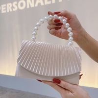 Abito da sera in raso con texture transfrontaliera pochette con patta plissettata di perle con fodera in poliestere chiusura aperta borsa alla moda 2025