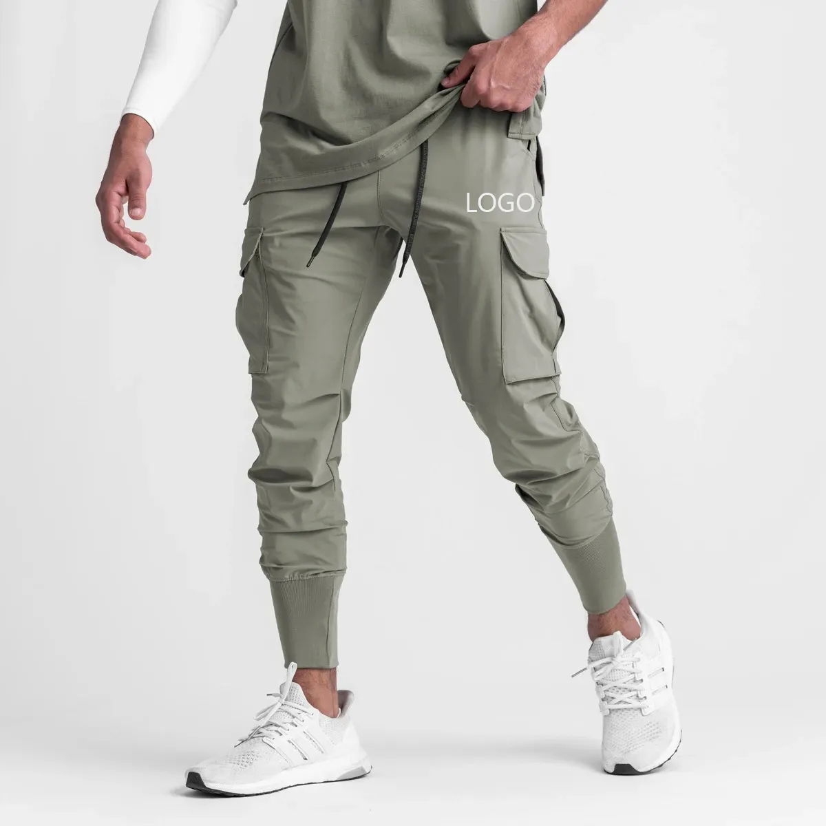 Pantalones de gimnasio de compresión de secado rápido Pantalones de chándal Venta al por mayor Deporte Jogging Pantalones de chándal de entrenamiento para hombre de alta calidad Fitness