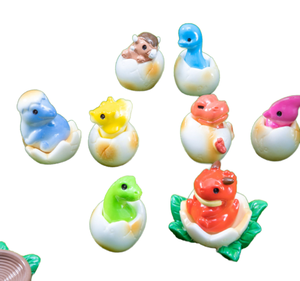 Juguete de dinosaurio en miniatura de resina y huevo de bebé al por mayor, figura educativa de dibujos animados para niños, bolsa sorpresa de la suerte para Navidad - Product Image 1