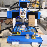 Petite fraiseuse CNC 4040 avec broche ATC pour la conception de portes en bois, fraiseuse CNC 4 axes
