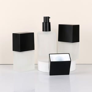 Botella de crema de bomba para loción Bomba de suero Botella de vidrio cuadrada Base Venta al por mayor Cuidado de la piel sin aire Botella de bomba sin aire esmerilada - Product Image 1