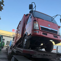 Camion de fret à caisse fermée Sinotruk Howo 4x2 d'occasion à bas prix, capacité de charge de 10 tonnes pour l'Afrique