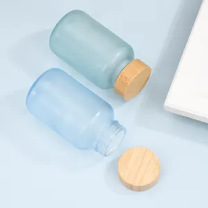 Food grade 200ml frosted blue empty glass bottle with gold silver cap for pill capsule tablet fish oil with bamboo cap