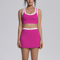 Sportbeha en rok set met kleurblokken, nylon en spandex, mouwloos, cropped top, hoge taille, tennisrok, workout outfit, tweedelig