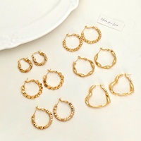 Anting-anting hoop bergaya barat dari paduan seng, desain minimalis unik, bentuk tidak beraturan, polos, dan trendi.