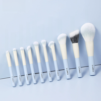 Kit de pinceaux de maquillage végétaliens professionnels ensemble de voyage de fond de teint de luxe avec sac bleu de marque privée pour le visage