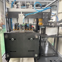 Machine de soufflage automatique de bouteilles PET pour eau gazeuse, 4 cavités, avec système rotatif, incluant pompe, moteur et PLC