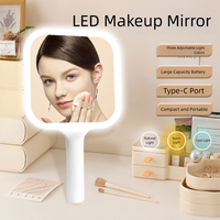 Miroir de courtoisie de voyage éclairé à main rechargeable avec trois modes de couleur pour les filles contrôle par capteur tactile Type-C alimenté